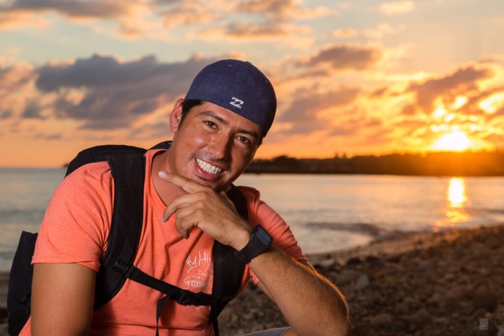Juan Villa, professional photographer in Punta de Mita, on the beach at sunset